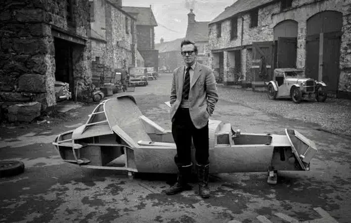 Frank Costin, co-founder of Marcos and aeronautical engineer, photographed beside one of his early aerodynamic body shells